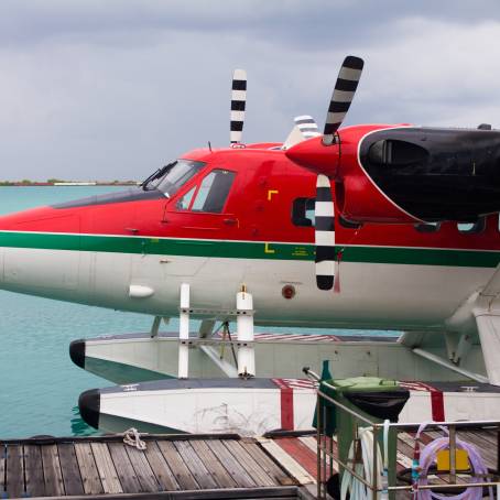 Aerial Shot of Seaplane Landing on Maldives Island