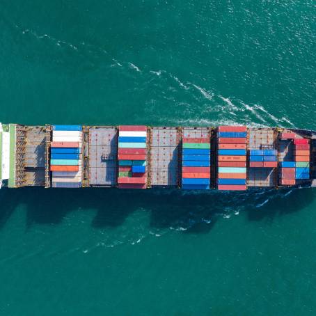 Aerial View of Large Container Cargo Ship on Open Ocean