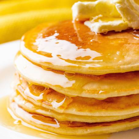 American Pancakes with Butter and Maple Syrup, Isolated