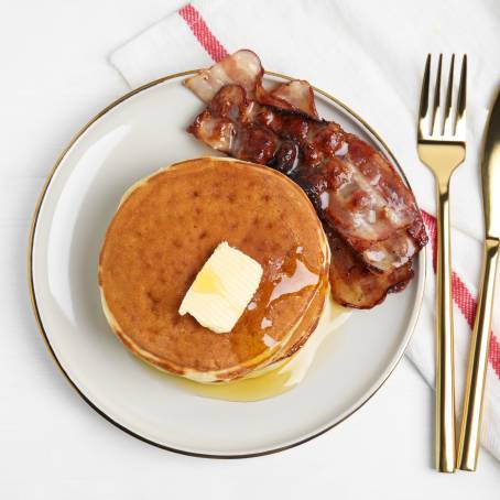 American Pancakes with Syrup and Butter on White Background