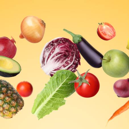 Assorted Fresh Vegetables Falling on White Surface