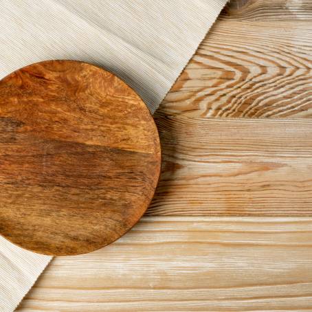 Beautiful Round Wood Table on White Backdrop