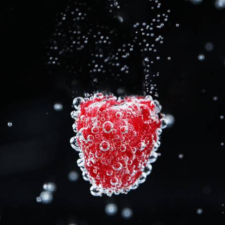 Berry Close Up in Sparkling Mineral Water with Tiny Bubbles