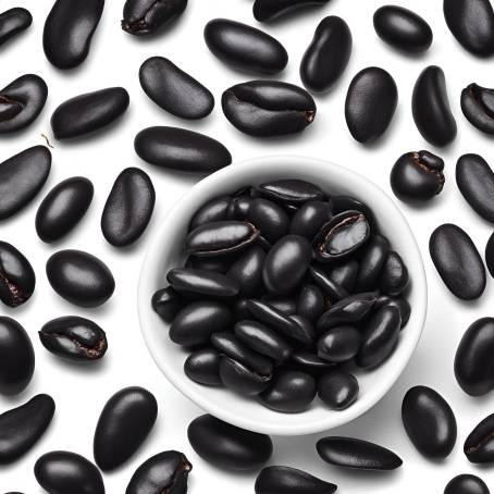 Ceramic Spoon with Black Beans Isolated on Black Detailed Close Up Food Photography