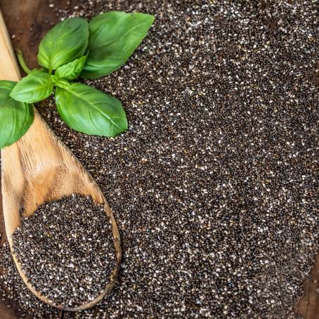 Chia Seeds in a Wooden Spoon with Rich Nutrients on a Minimalist Background