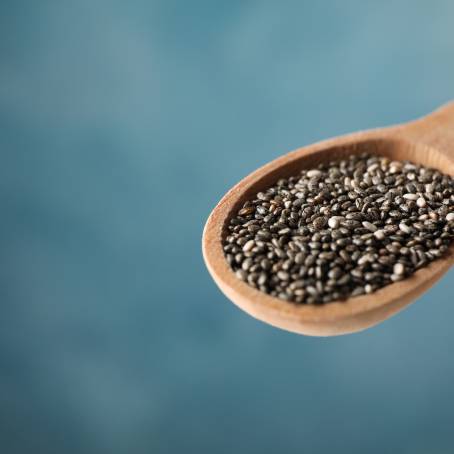 Chia Seeds with Essential Nutrients and Omega3 in a Wooden Spoon