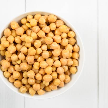 Chickpeas CloseUp Pile Isolated on White Surface