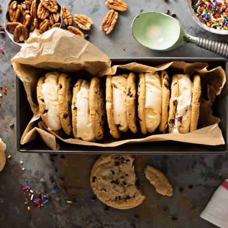 Chocolate Chip Cookie Ice Cream Sandwiches with Nuts and Caramel