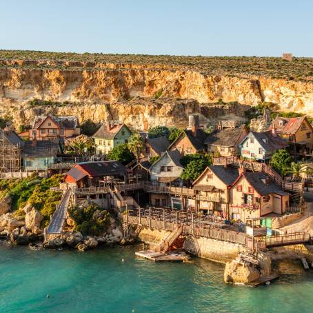 Cinematic Popeye Village, Malta Coastal Whimsy  Vibrant Colors