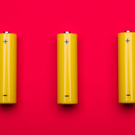 Close Up of AA Batteries on White Background