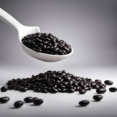 Close Up of Black Beans in White Ceramic Spoon on Black Background Isolated Food Photography