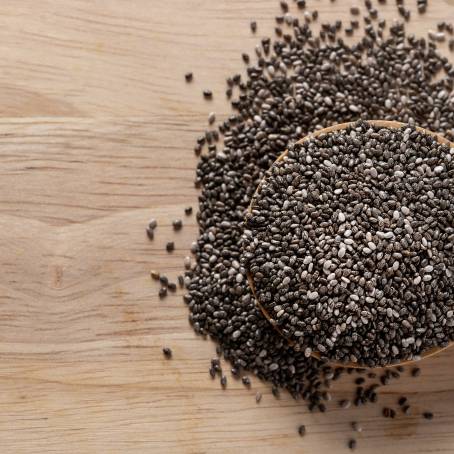 Close Up of Chia Seeds in a Wooden Spoon