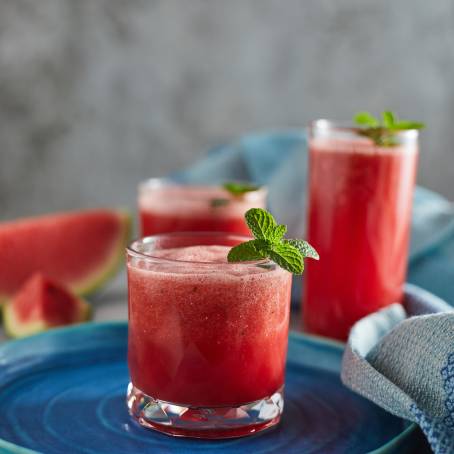 Close Up of Fresh Watermelon Juice in Glasses, Perfect for a Refreshing Summer Drink