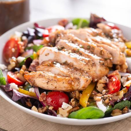 Closeup of Gourmet Chicken Salad with Tomato and Crisp Vegetables