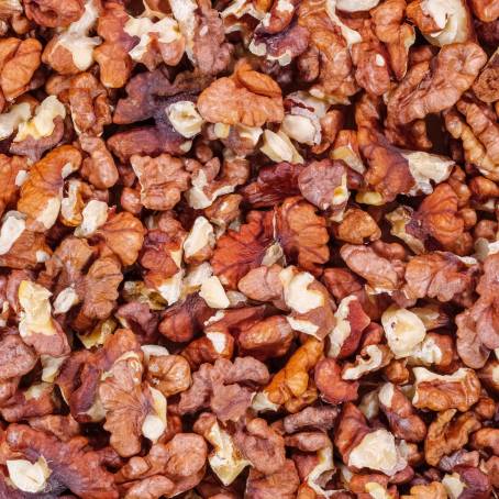 CloseUp Peeled Walnuts on Isolated White Background