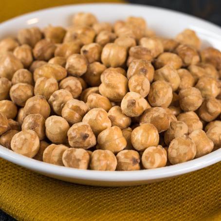 CloseUp Raw Chickpeas on Isolated White Surface