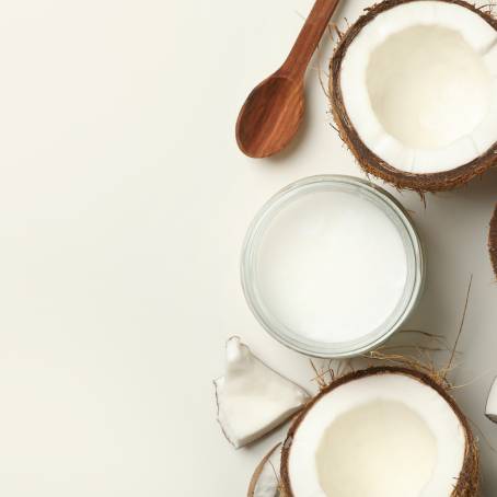 Coconut Half with Slice and Piece Isolated on White Coco Nut with Leaf, Full Depth of Field