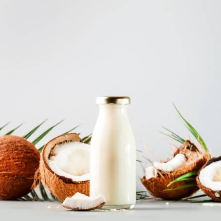 Coconut Vegan Milk in Eco Friendly Bottles Displayed