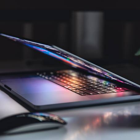 Colorful Neon Lights on Backlit Keyboard CloseUp