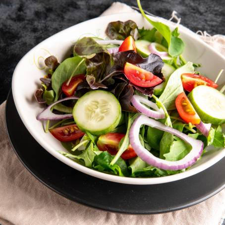 Colorful Salad Bowl with Spinach, Cherry Tomatoes, Lettuce, Cucumber and More Vegetables, Isolated