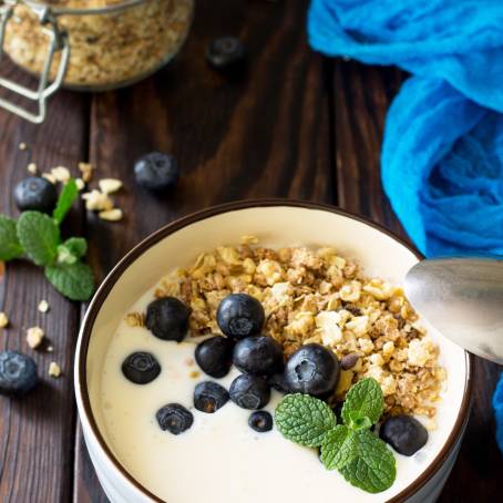 Comforting Homemade Granola with Milk for Breakfast