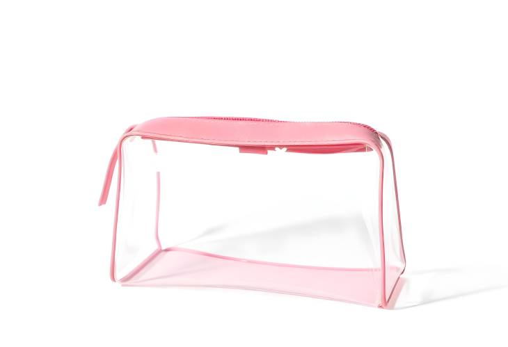 Cosmetic Bag with Pink Leather and Transparent Design Isolated on White Background