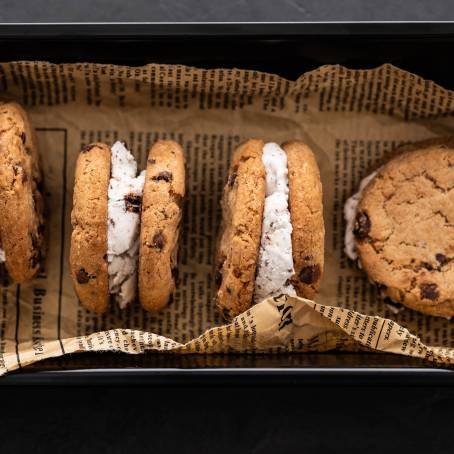 Creamy Ice Cream Sandwiches with Nuts, Caramel, and Chocolate Chip Cookies Overhead Shot