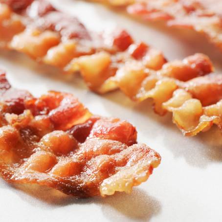 Crispy Bacon Strip Isolated on White Background