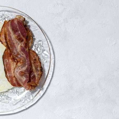 Crispy Fried Bacon Slice Isolated on White