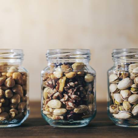 Crunchy Healthy Cookies with Dried Fruits and Nuts in Glass Jar