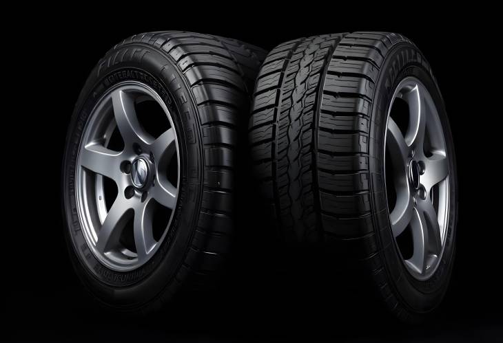 Dark Background Displaying New Tires CloseUp of Car and Vehicle Tires