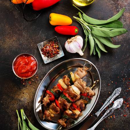 Delicious Grilled Vegetables and Chicken on Rustic Wooden Table