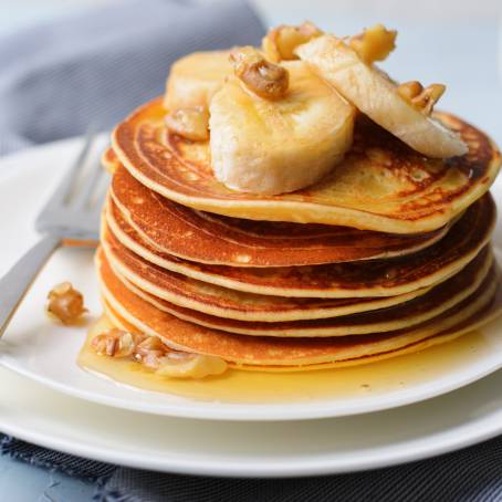 Delicious Pancakes with Honey Close Up