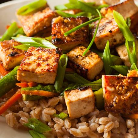 Delicious Tofu StirFry with Sesame Seeds and Greens