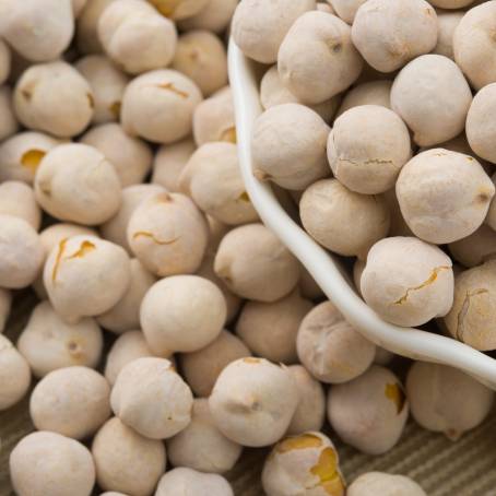 Detailed Chickpeas Pile Isolated on White Surface