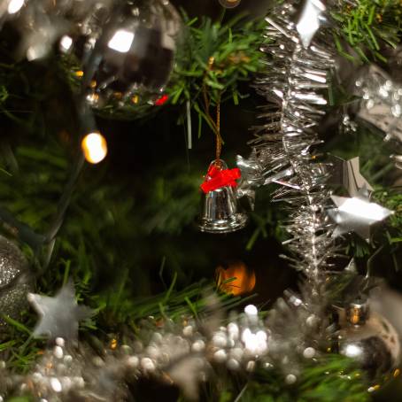 Elegant Christmas Tree with Glass Ball Ornaments and Decorations Closeup of Festive Sparkle