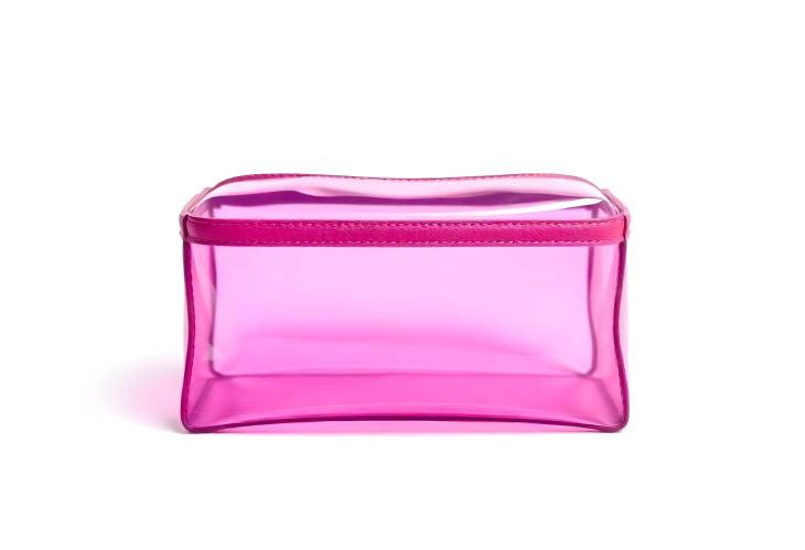 Elegant Transparent and Pink Leather Cosmetic Bag Isolated on White Background