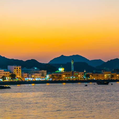 Evening Glow Over Muttrah Sunset Along Muscat Coastline