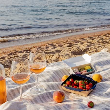 Festive Outdoor Drink Station with Peach Lemonade Bottles