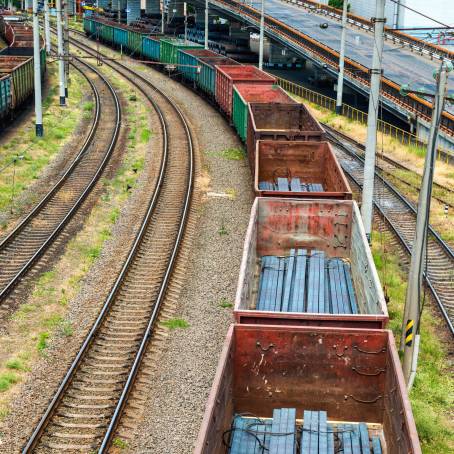 Freight Wagons Train Passing by the Station