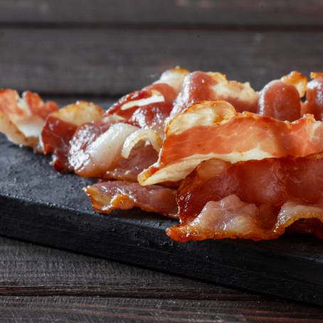 Fried Crispy Bacon Slice Isolated on Pure Background