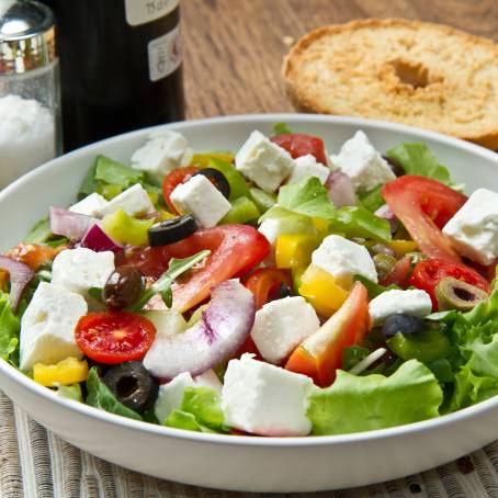 Greek Salad with Cheese, Fresh Veggies, and White Background