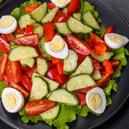 Healthy Salad with Spinach, Cherry Tomatoes, Lettuce, Cucumber and More Isolated Bowl