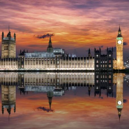 Historic Big Ben and Westminster Palace by the Thames at Twilight