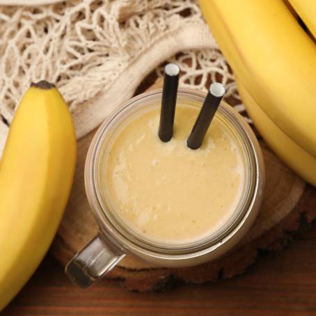 Homemade Banana Smoothie in Mason Jars for Breakfast