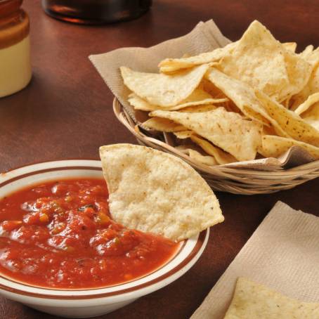 Homemade Corn Chips and Fresh Tomato Salsa in Bowl