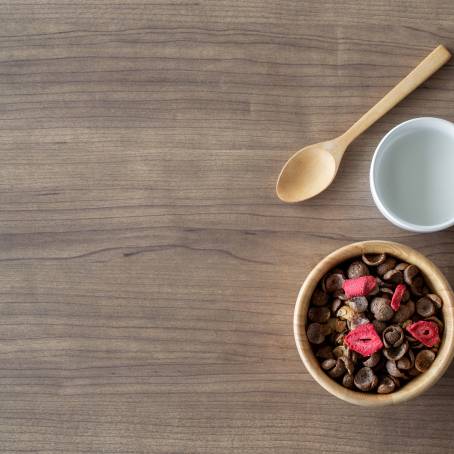 Homemade Granola with Milk and Honey for Breakfast