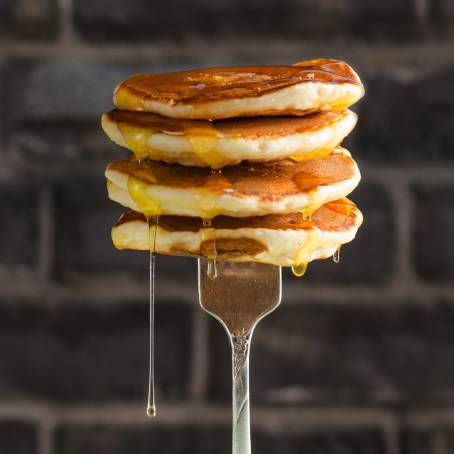 Honey Glazed Pancakes on a White Background