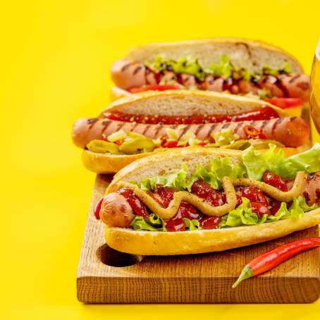 Hot Dog with Mustard and Ketchup, Paired with a Refreshing Beer