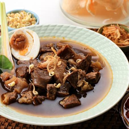 Indonesian Rawon Soup Black Beef Stew with Rice and Chili